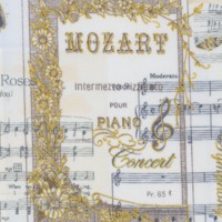 Elegant Gilded Musical Instruments and Vintage Manuscripts