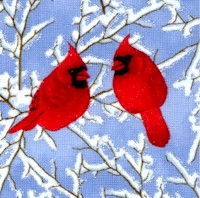 Beautiful Cardinals o nSnow-Capped Trees with Silver Glitter