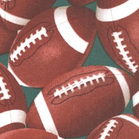 In the Game - Tossed Footballs on Green