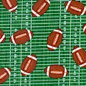 Small Scale Footballs on Green Field